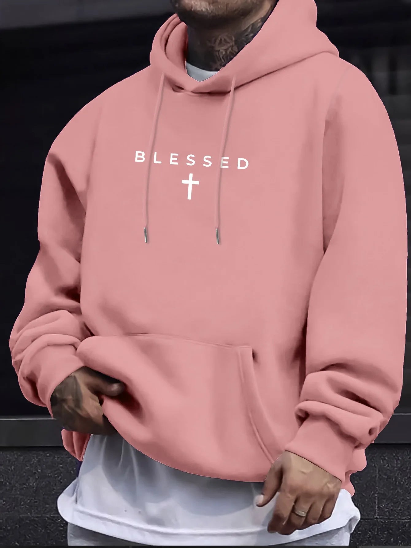 A men's casual hooded sweater with blessing cross design and geometric patterns in a regular fit suitable for spring and autumn