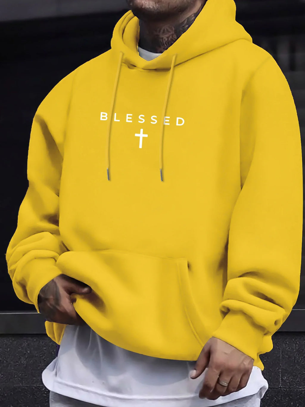 A men's casual hooded sweater with blessing cross design and geometric patterns in a regular fit suitable for spring and autumn