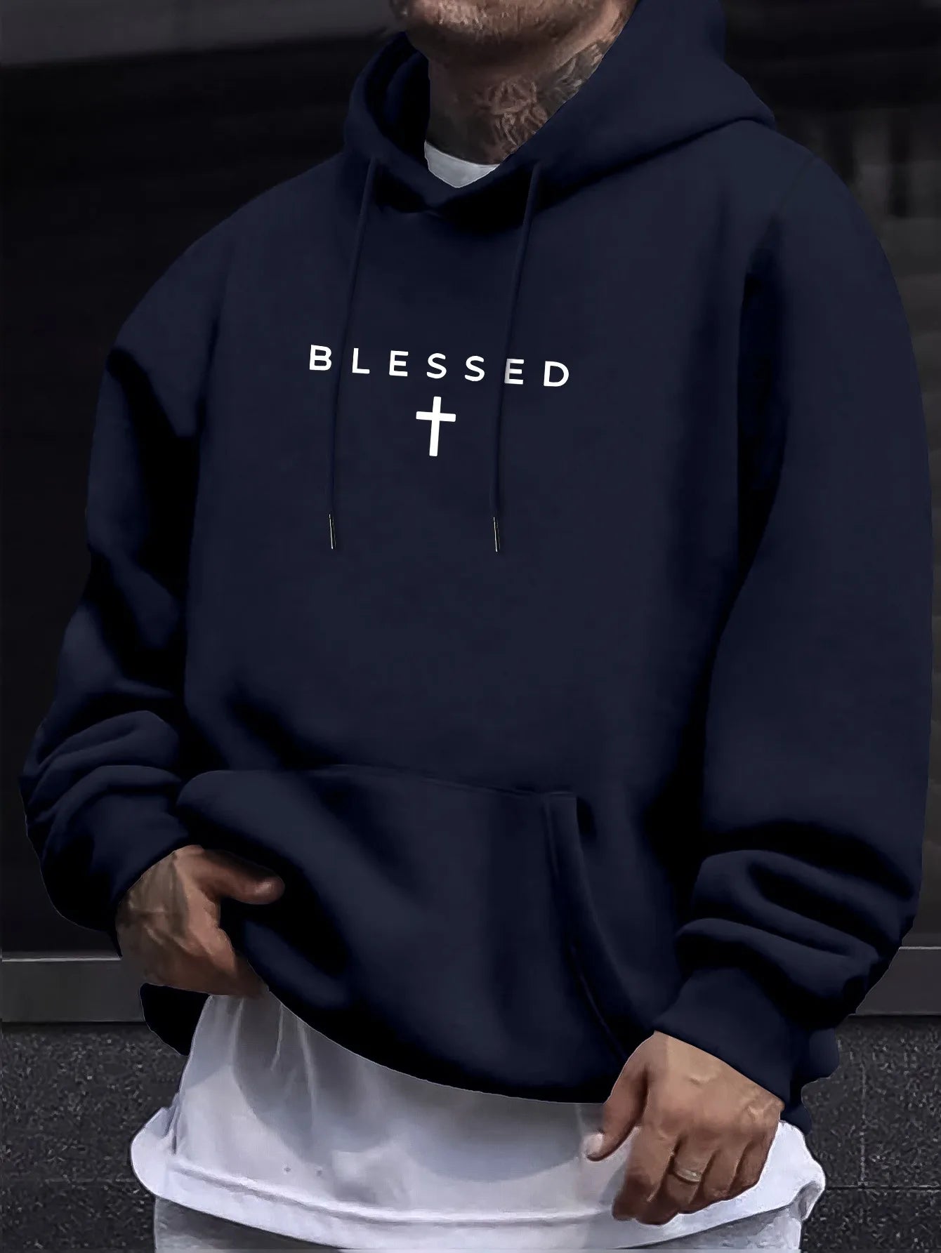 A men's casual hooded sweater with blessing cross design and geometric patterns in a regular fit suitable for spring and autumn