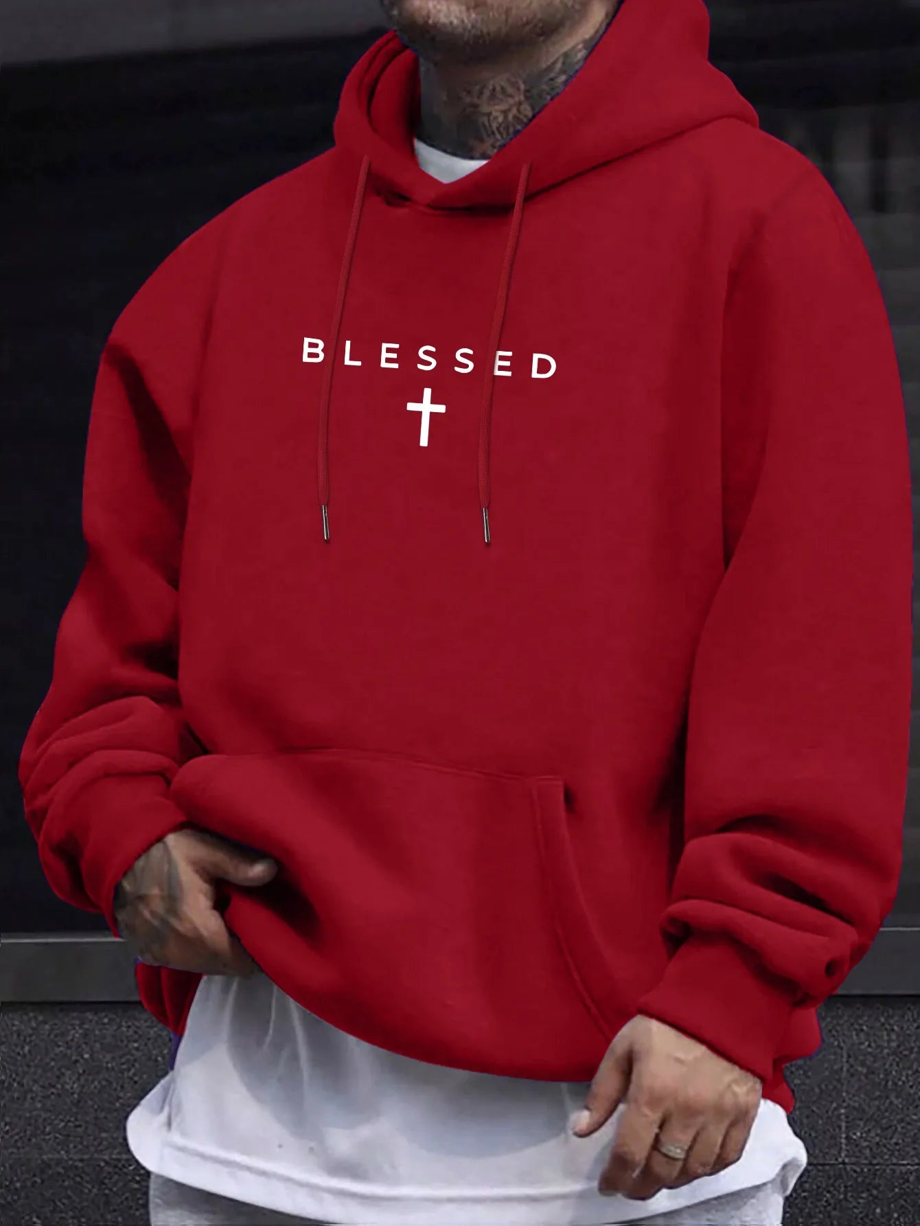 A men's casual hooded sweater with blessing cross design and geometric patterns in a regular fit suitable for spring and autumn