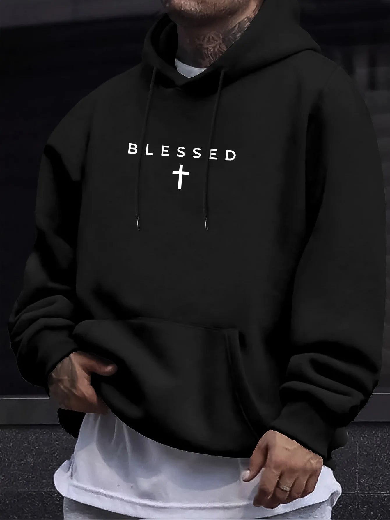 A men's casual hooded sweater with blessing cross design and geometric patterns in a regular fit suitable for spring and autumn