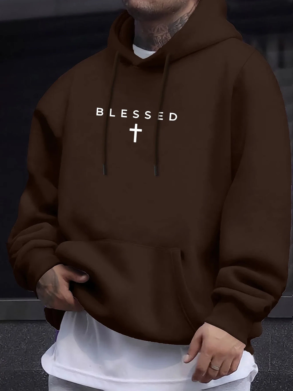 A men's casual hooded sweater with blessing cross design and geometric patterns in a regular fit suitable for spring and autumn