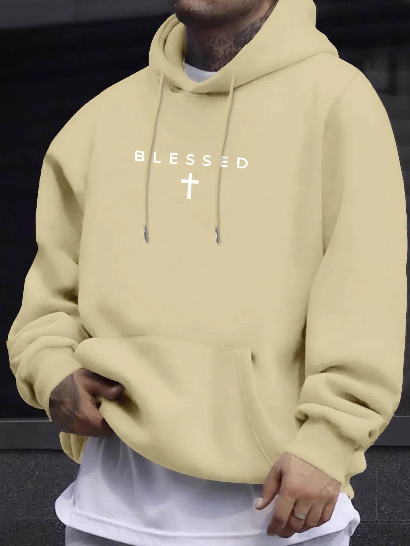 A men's casual hooded sweater with blessing cross design and geometric patterns in a regular fit suitable for spring and autumn